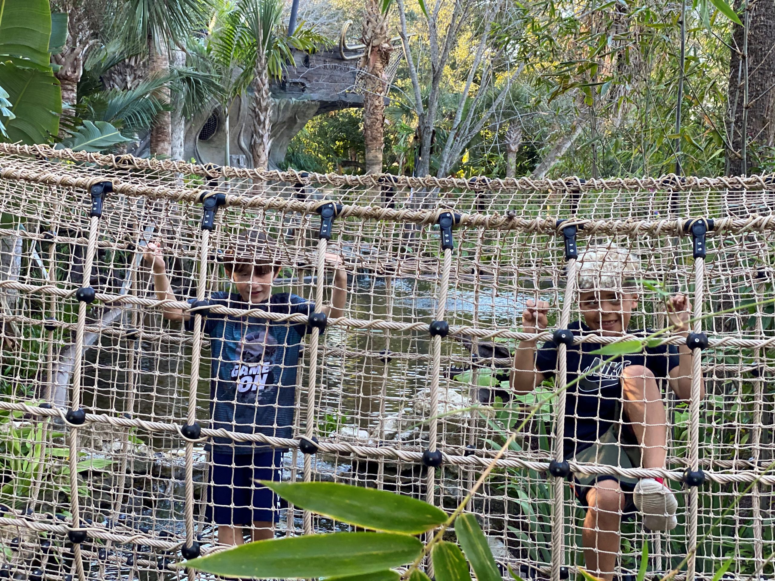 https://mckeechildrensgarden.org/wp-content/uploads/2023/09/Sebastian-and-Kayden-Metcalf-on-Monkey-Bridge-scaled.jpg